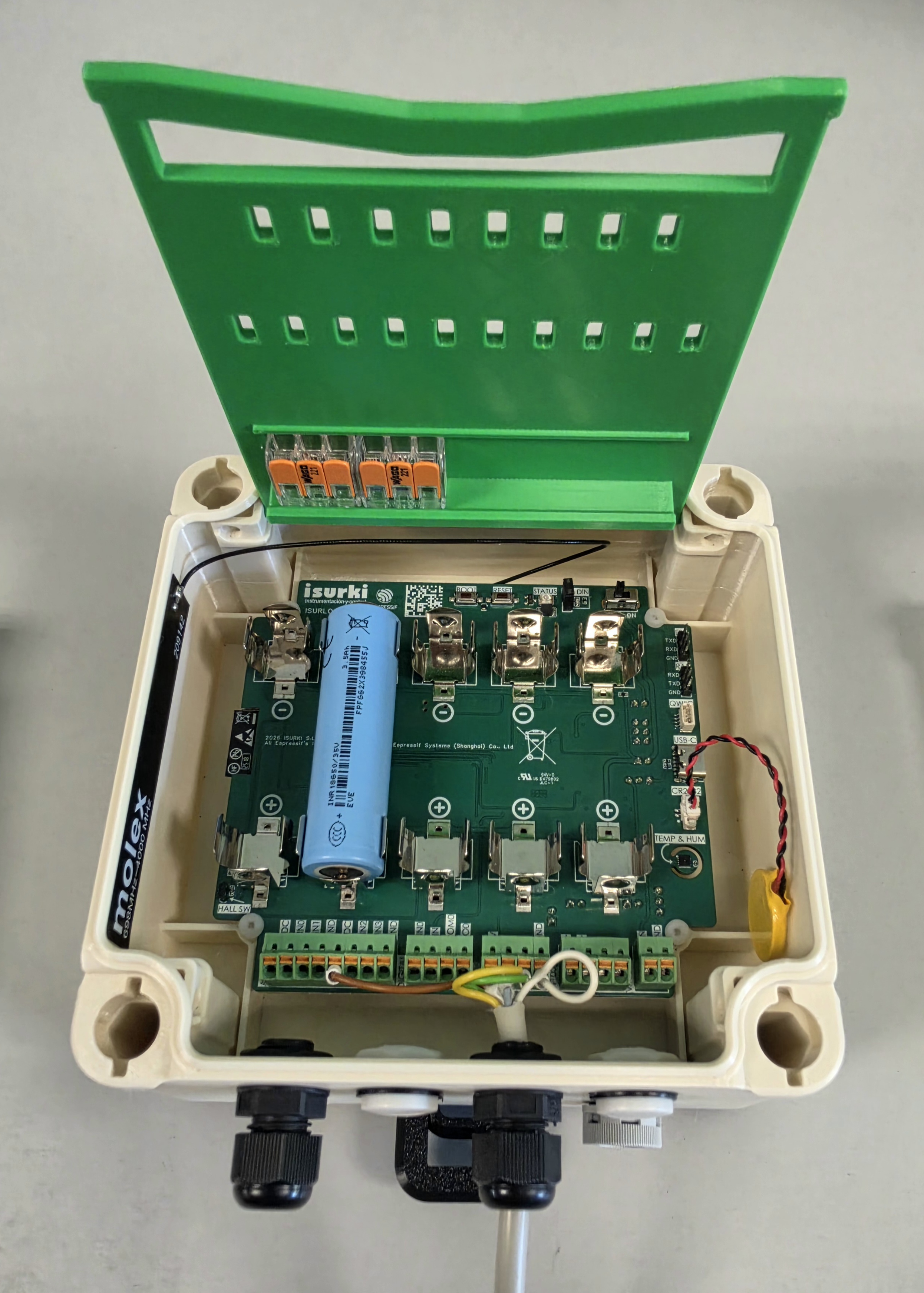 The ISURLOG board on its own, out of the enclosure, showing the Molex antenna cable and the Li-Ion 18650 battery